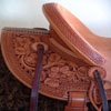 Cow Boss Gullet - 7 -1/2H by 6 - 1/4W by 4, Horn - 3 by 3 inch Round Horn, 94 degree Quarter Horse bars,7/8ths full in skirt riggin, 16 - 1/4 inch seat Cheyenne Roll - 1 - 3/4 inch and decorated with Valleys' Sheridan floral tooling pattern dallied by Valleys' Vaquero Lace border.